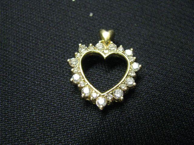 Appraisal: Diamond Heart Pendant round diamonds totaling carat in k yellow