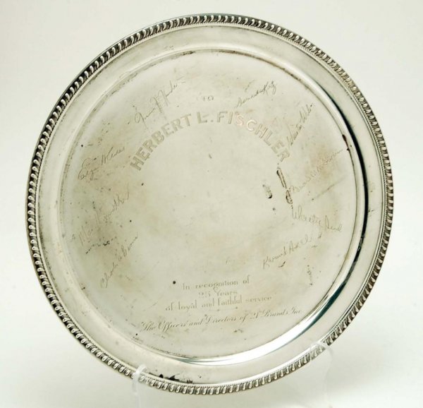 Appraisal: A sterling presentation charger Inscribed To Herbert L Fischler In