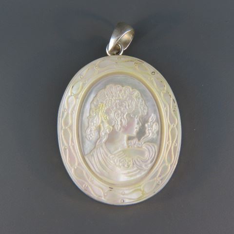 Appraisal: Carved Cameo Pendant mother-of-pearl sterling silver setting oval x plus