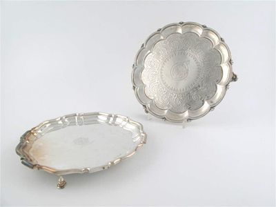 Appraisal: A Victorian waiter with scalloped and bead border engraved decoration