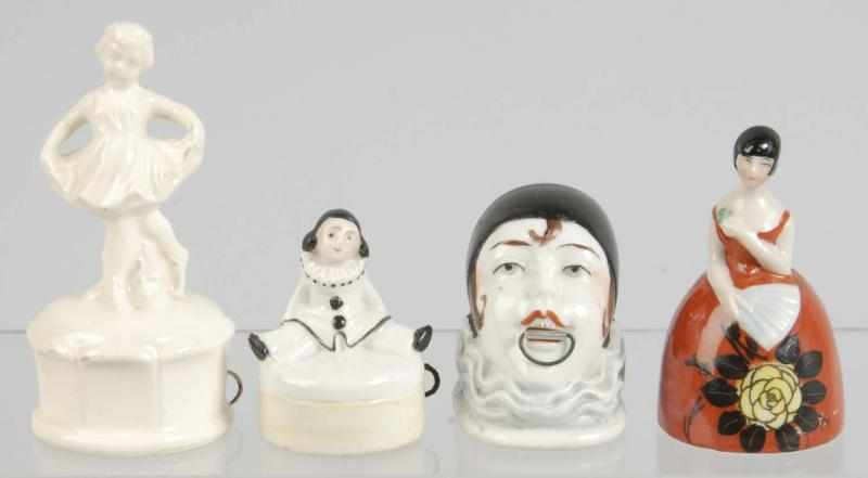 Appraisal: Lot of Porcelain Figural Sewing Tape Measures Description Includes one