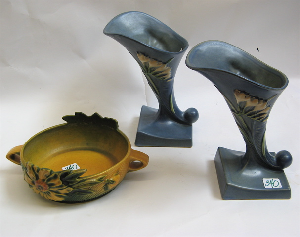 Appraisal: THREE AMERICAN ROSEVILLE ART POTTERY PIECES pair blue Freesia Cornucopia