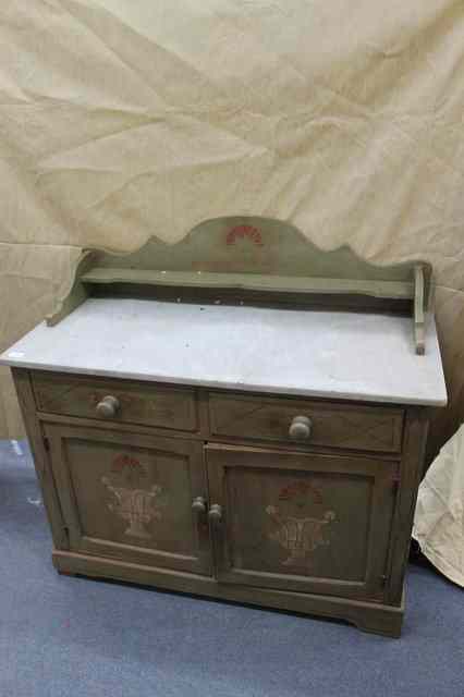 Appraisal: A PAINTED PINE MARBLE TOPPED WASH STAND with raised back