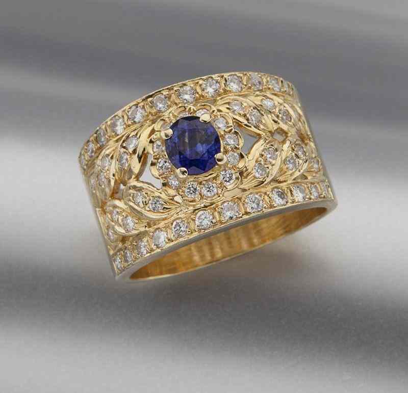 Appraisal: K gold Ceylon sapphire and diamond ringfeaturing an oval brilliant