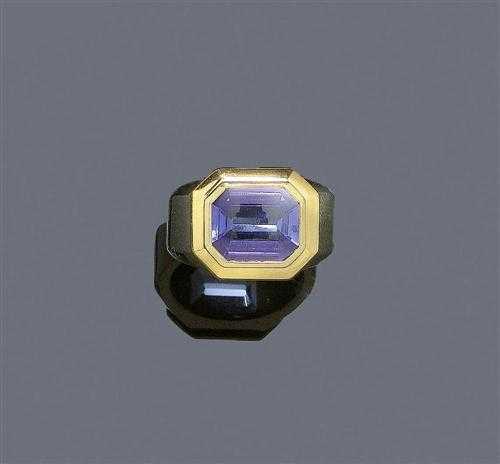 Appraisal: TANZANITE PLATINUM AND GOLD RING FRIEDEN Platinum and yellow gold