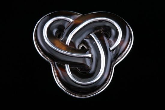 Appraisal: WILLIAM SPRATLING STERLING SILVER AND TORTOISE SHELL BROOCH Three interlocking