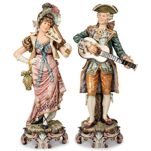 Appraisal: A Pair of Continental Majolica Figures th Century each bearing