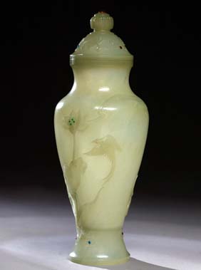 Appraisal: CELADON JADE COVERED VASE Tall and extremely thinly carved Chinese