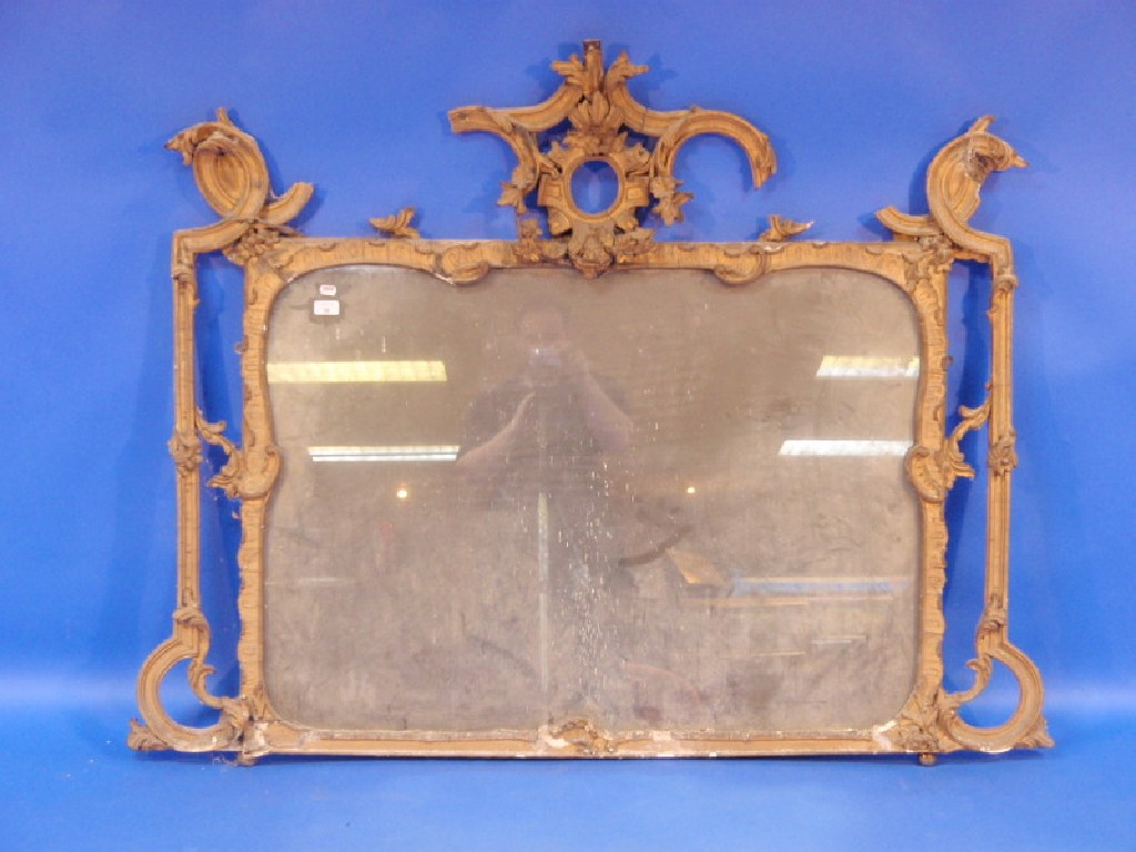 Appraisal: An thC ornate gilt framed overmantel mirror of scroll and