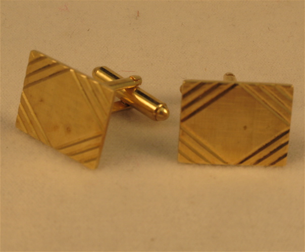 Appraisal: PAIR OF FOURTEEN KARAT GOLD CUFF LINKS together weighing grams