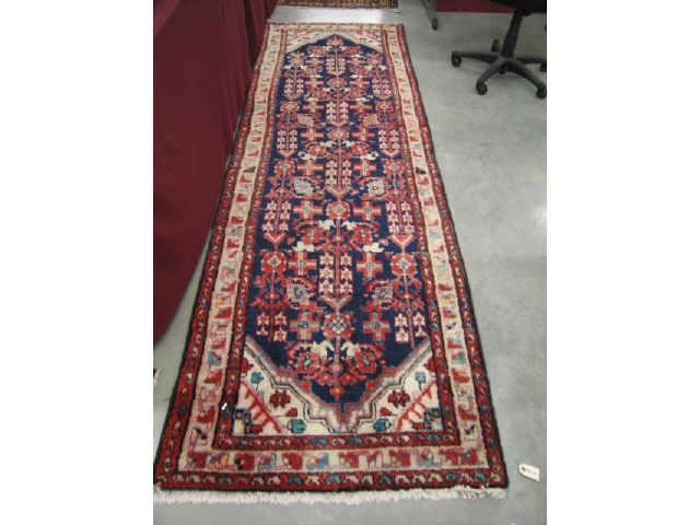 Appraisal: Heriz Persian Handmade Runner geometric medallions red field ' x