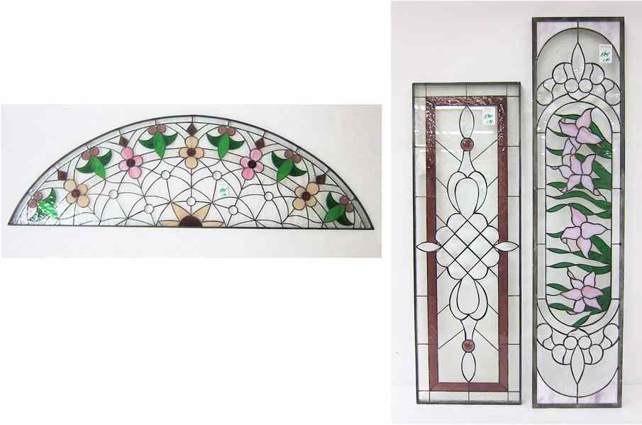 Appraisal: THREE STAINED AND LEADED GLASS WINDOW PANELS in steel sashes