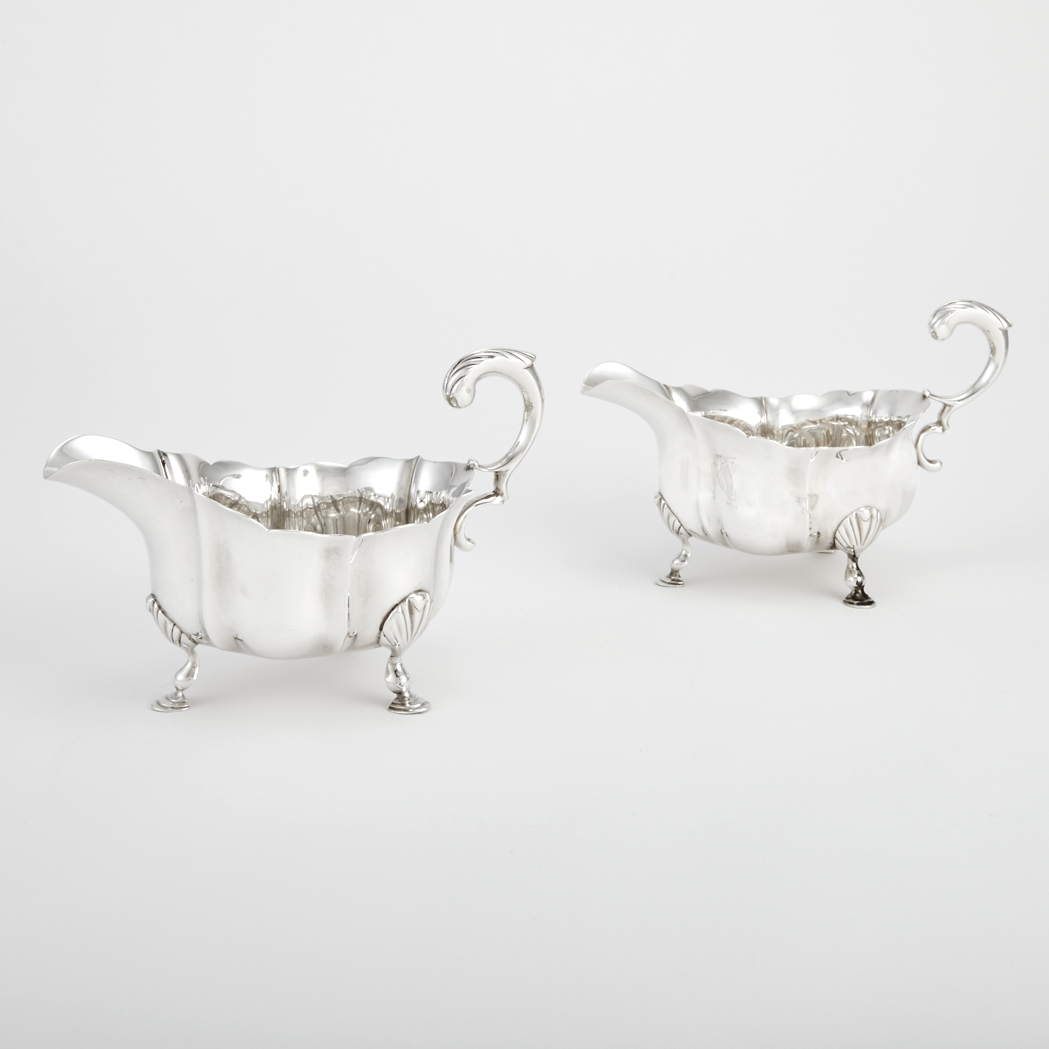 Appraisal: Pair of George II Sterling Silver Sauceboats James Gould London