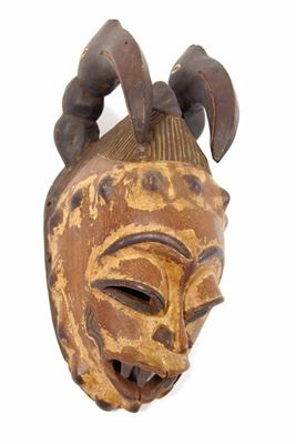 Appraisal: A central west African mask with bird head horns and