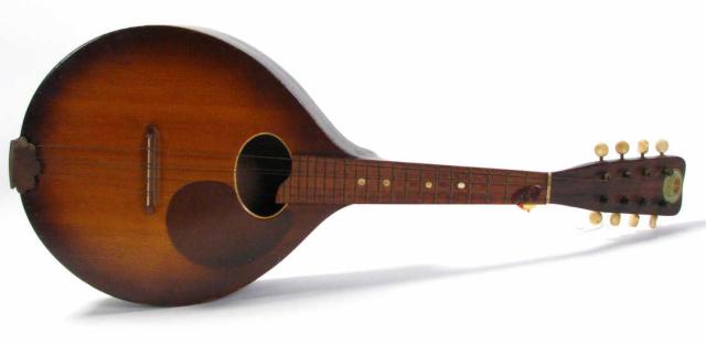 Appraisal: 's Regal Flatback Mandolin oval sound bowl original ivoroid tuning