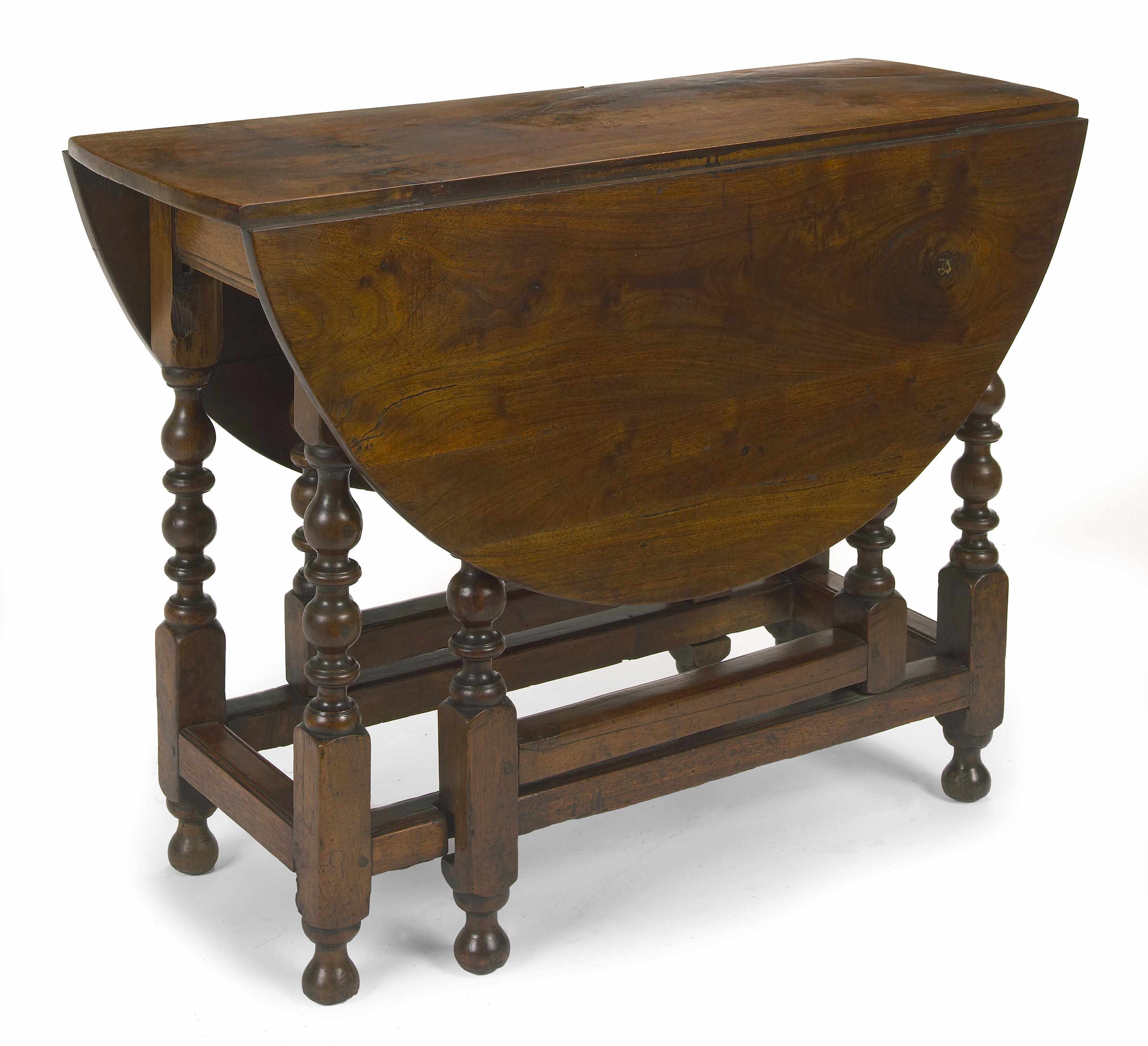 Appraisal: A William and Mary walnut and maple gate leg table