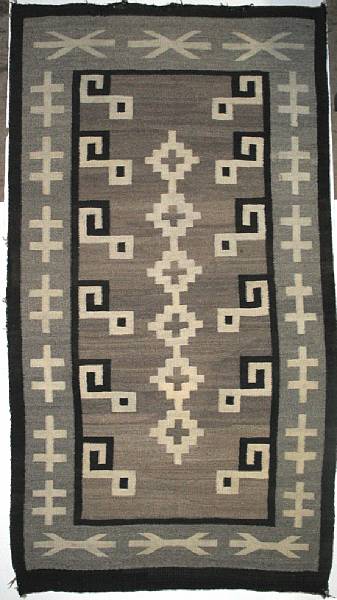 Appraisal: A Navajo Two Grey Hills rug size approximately ft in