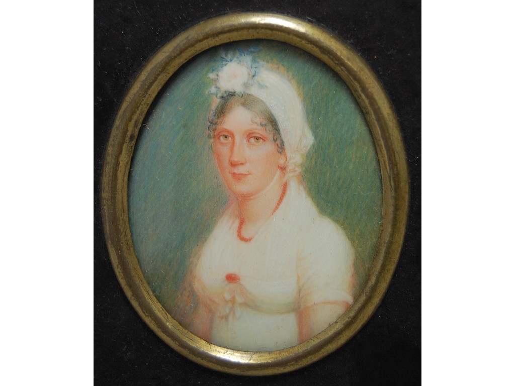 Appraisal: A Regency oval portrait miniature of a young lady in