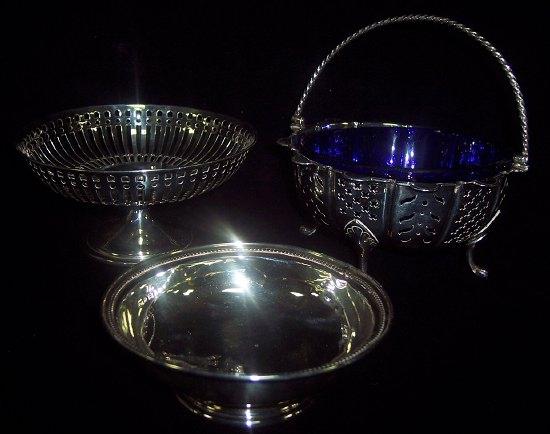 Appraisal: A pierced bowl with loop handle cm wide Sheffield with