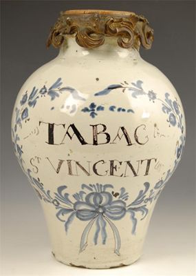 Appraisal: A Faience tobacco jar inscribed 'TABAC ST VINCENT' with an