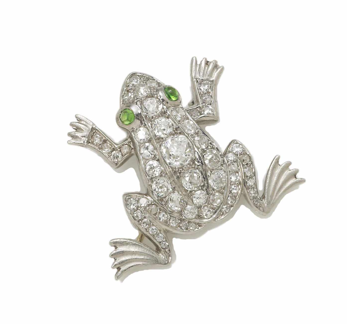 Appraisal: A diamond and demantoid garnet frog brooch French with partial