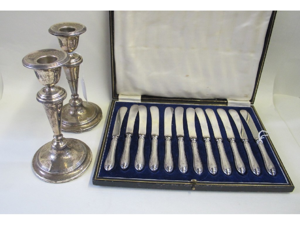 Appraisal: Lot comprising cased set of twelve silver handled knives and