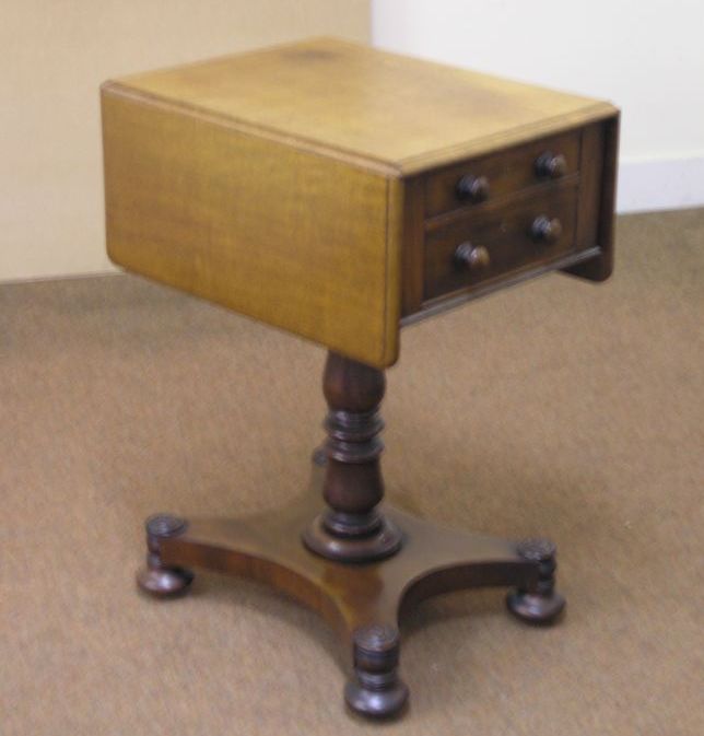 Appraisal: A William IV mahogany drop-leaf work table with two drawers