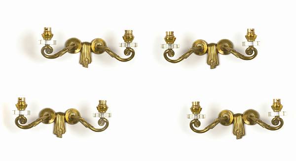 Appraisal: A set of four Jules Leleu gilt-bronze and glass two-light