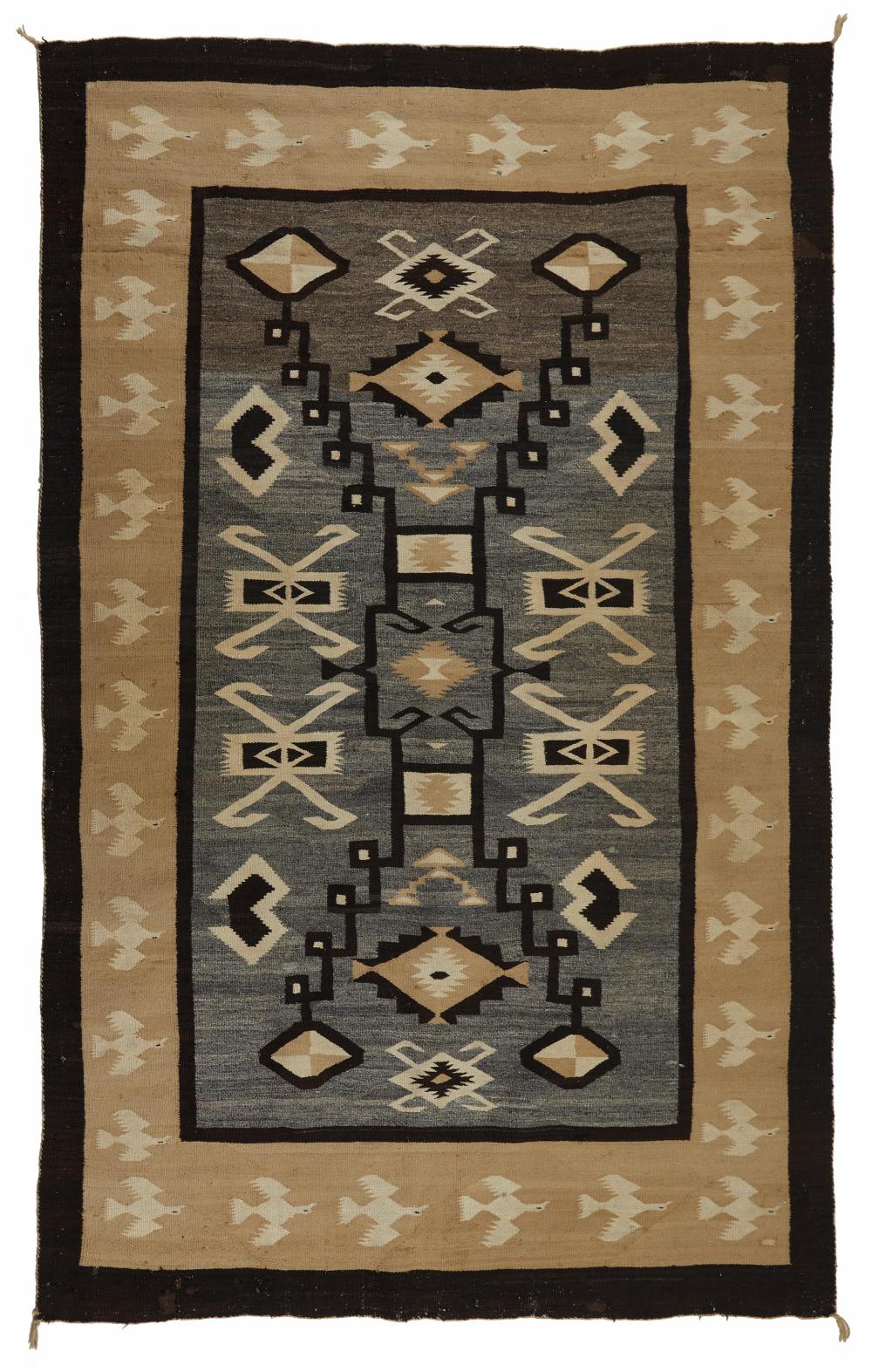 Appraisal: A Navajo Two Grey Hills storm pattern rug th Century