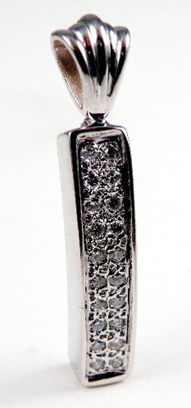 Appraisal: DIAMOND AND FOURTEEN KARAT GOLD PENDANT with pave' set diamonds