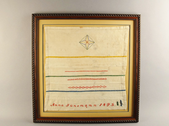 Appraisal: A Pennsylvania Dutch Sewing Sampler by Anna Junemann embroidery and