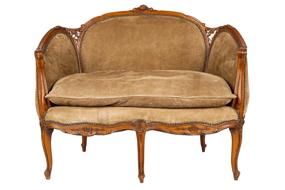 Appraisal: LOUIS XV STYLE CARVED WALNUT SETTEEcovered with light brown suede