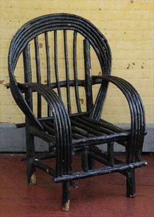 Appraisal: ADIRONDACK PAINTED TWIG ARMCHAIR The hoop back over rectangular seat