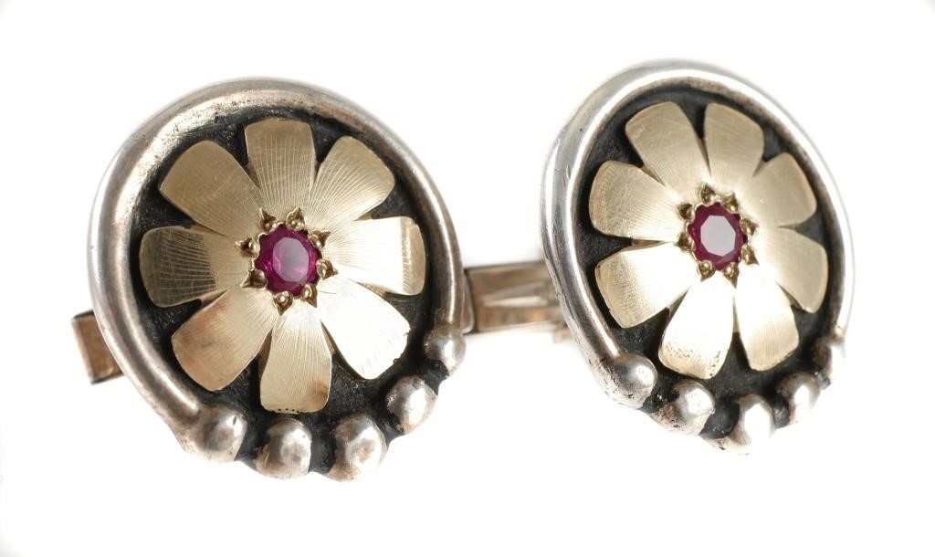 Appraisal: Pair of cufflinks in sterling silver with yellow and rose