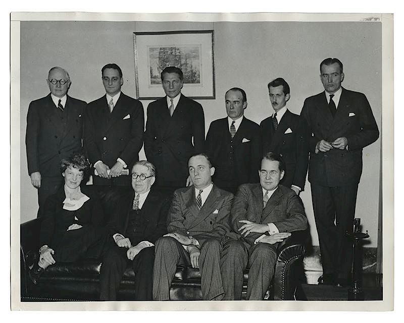 Appraisal: Amelia Earhart Press Photo with Aviation Officials Earhart Amelia Amelia