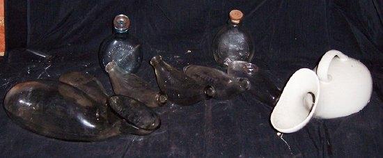 Appraisal: A small collection of baby feeding bottles and two bed