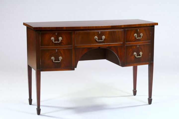 Appraisal: Hepplewhite-Style Bow-Fronted Mahogany Sideboard the top with a banded border