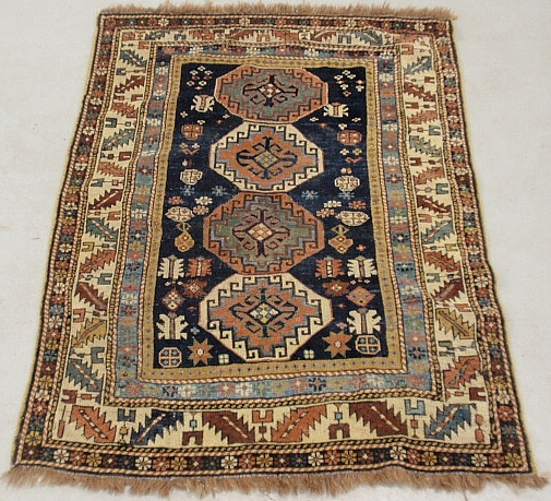 Appraisal: - Shirvan oriental hall carpet with a dark blue field