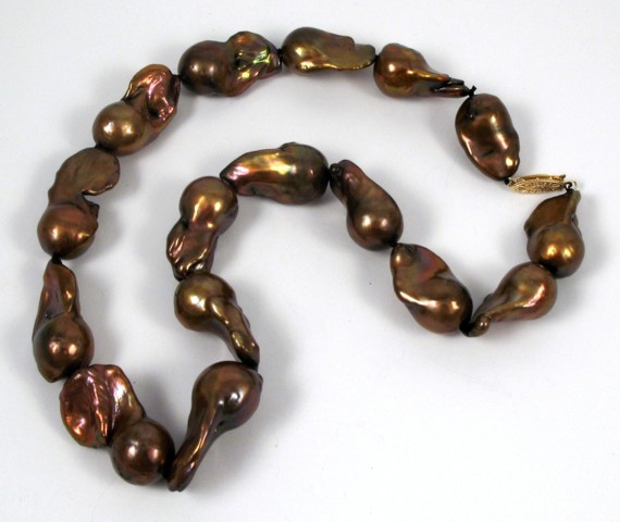 Appraisal: FRESHWATER BAROQUE PEARL NECKLACE strung with brown iridescent baroque pearls