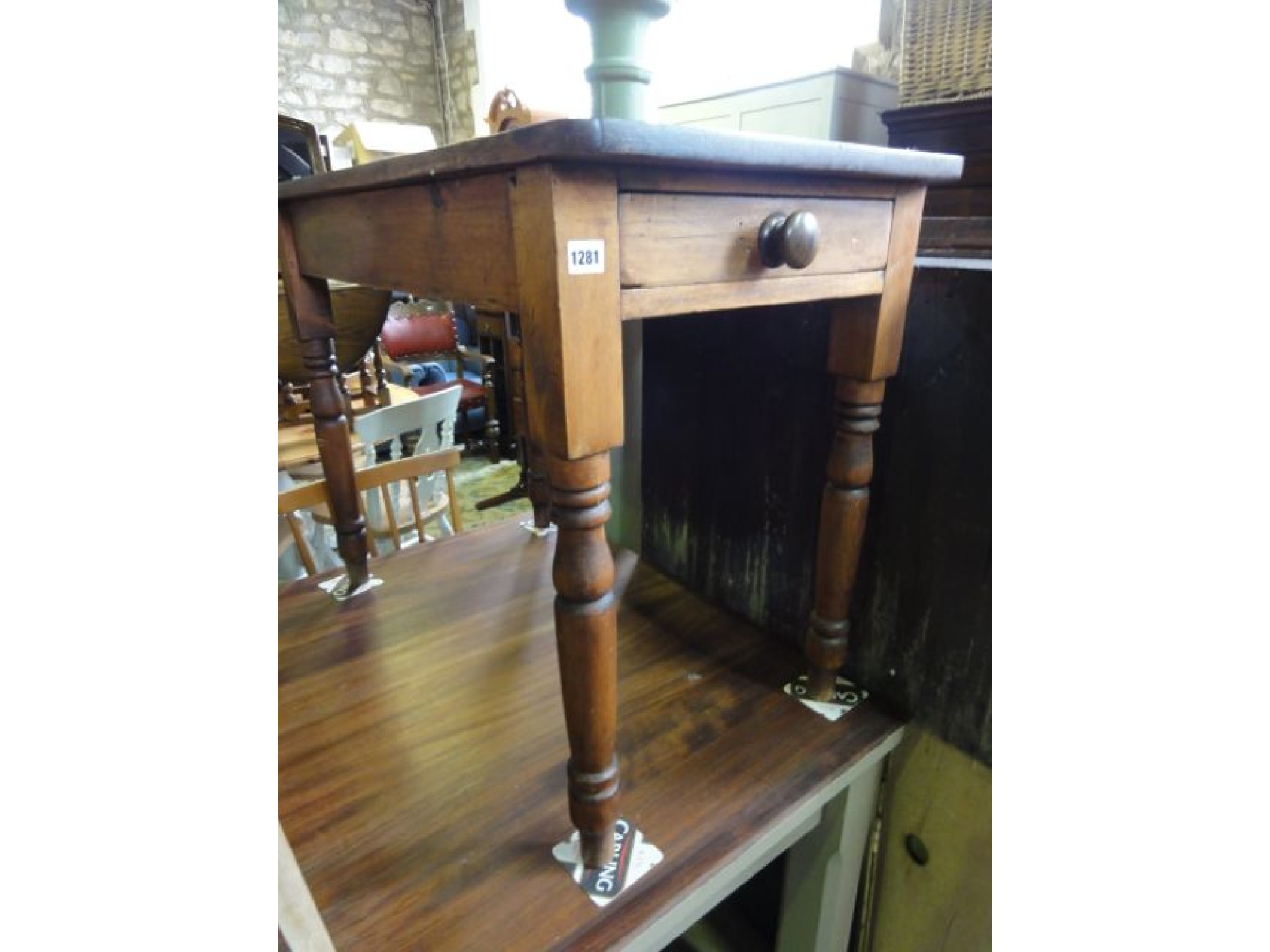 Appraisal: A vintage pine kitchen table the rectangular top with rounded