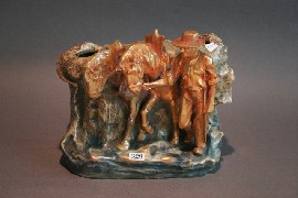 Appraisal: An Amphora figural group of a farmer with two horses