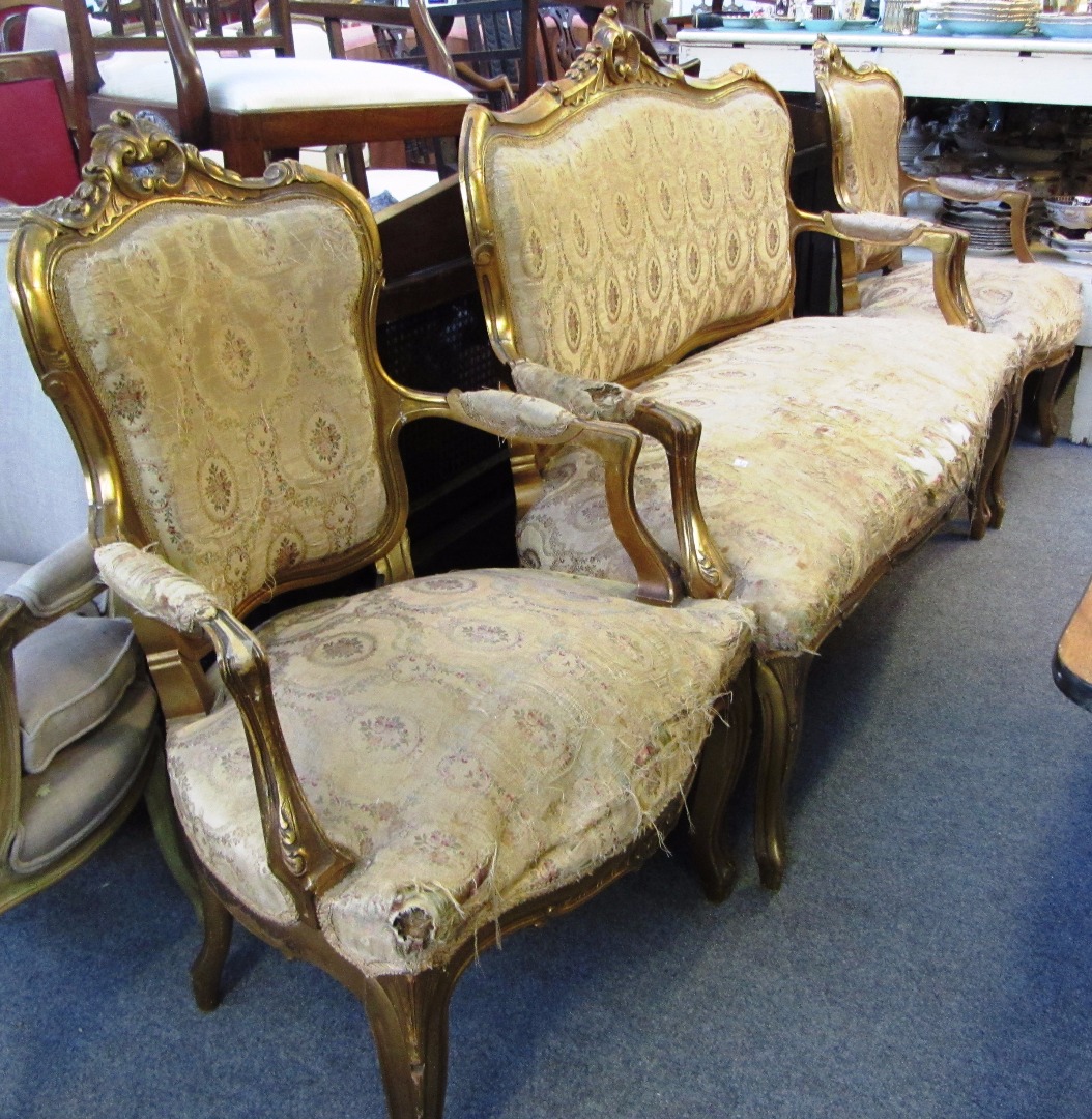 Appraisal: A Louis XV style gilt framed three piece salon suite