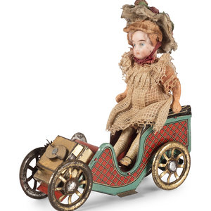 Appraisal: A D R G M Tin Car Toy with Doll