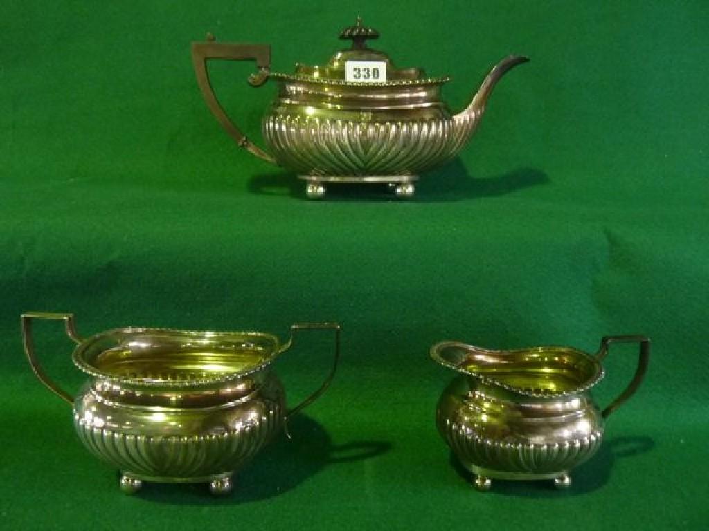 Appraisal: A three piece silver tea service hallmarks possibly for Barker