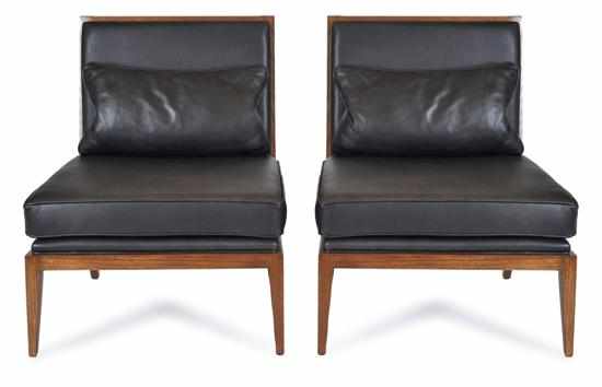 Appraisal: A PAIR OF LEATHER UPHOLSTERED EASY CHAIRS Each with an