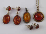 Appraisal: A mixed lot of white metal tests silver and amber