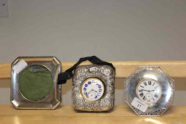 Appraisal: A PIERCED SILVER OCTAGONAL WATCH STAND complete with goliath pocket