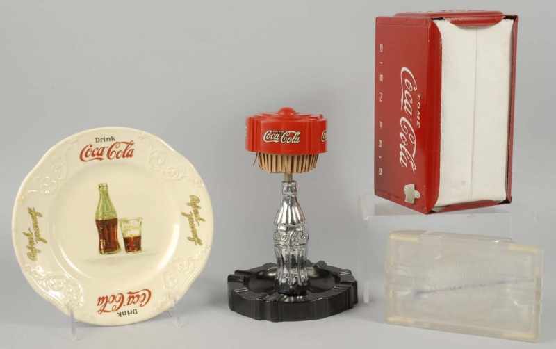 Appraisal: Lot of Coca-Cola Items Description Includes one plate one ashtray