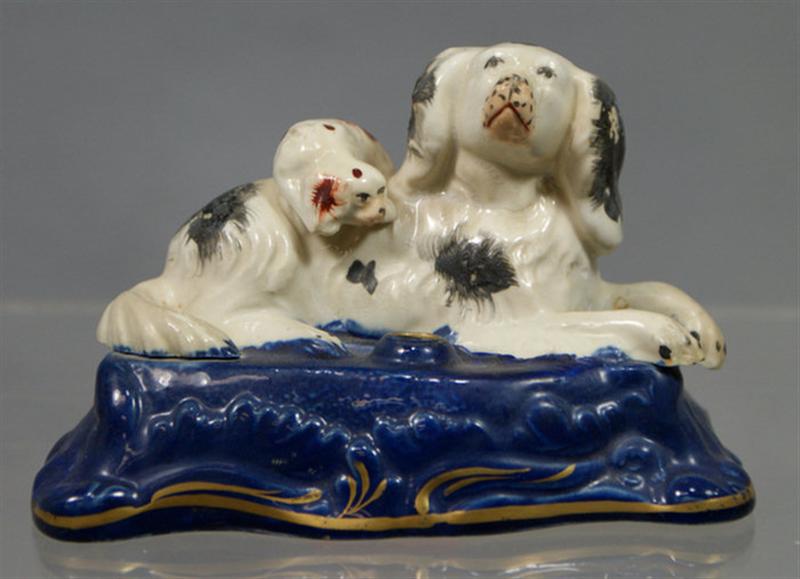 Appraisal: Staffordshire inkwell Spaniel with puppy on back blue base with