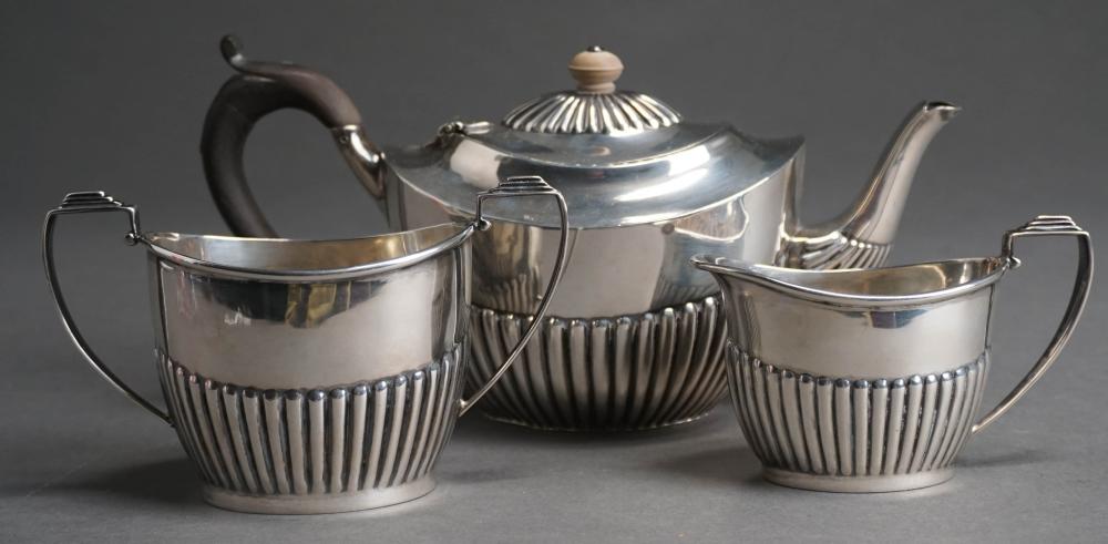 Appraisal: VICTORIAN GEORGE V STERLING SILVER ASSEMBLED THREE-PIECE TEA SERVICE AND